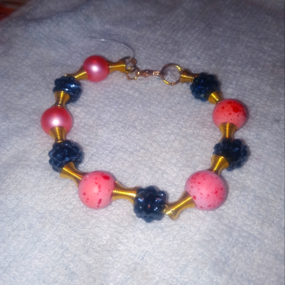 Handmade 6-inch Bracelet with Pink Pearl and Blue Flower Beads.